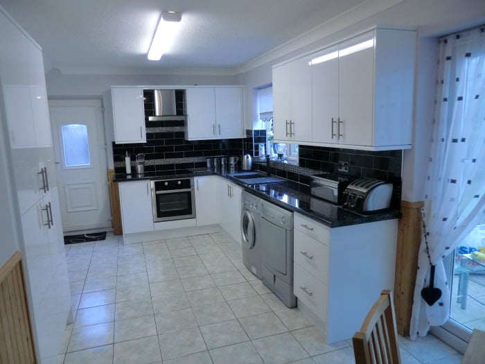 High_gloss_White_slab_door_2 RF Installations Chesterfield Kitchens